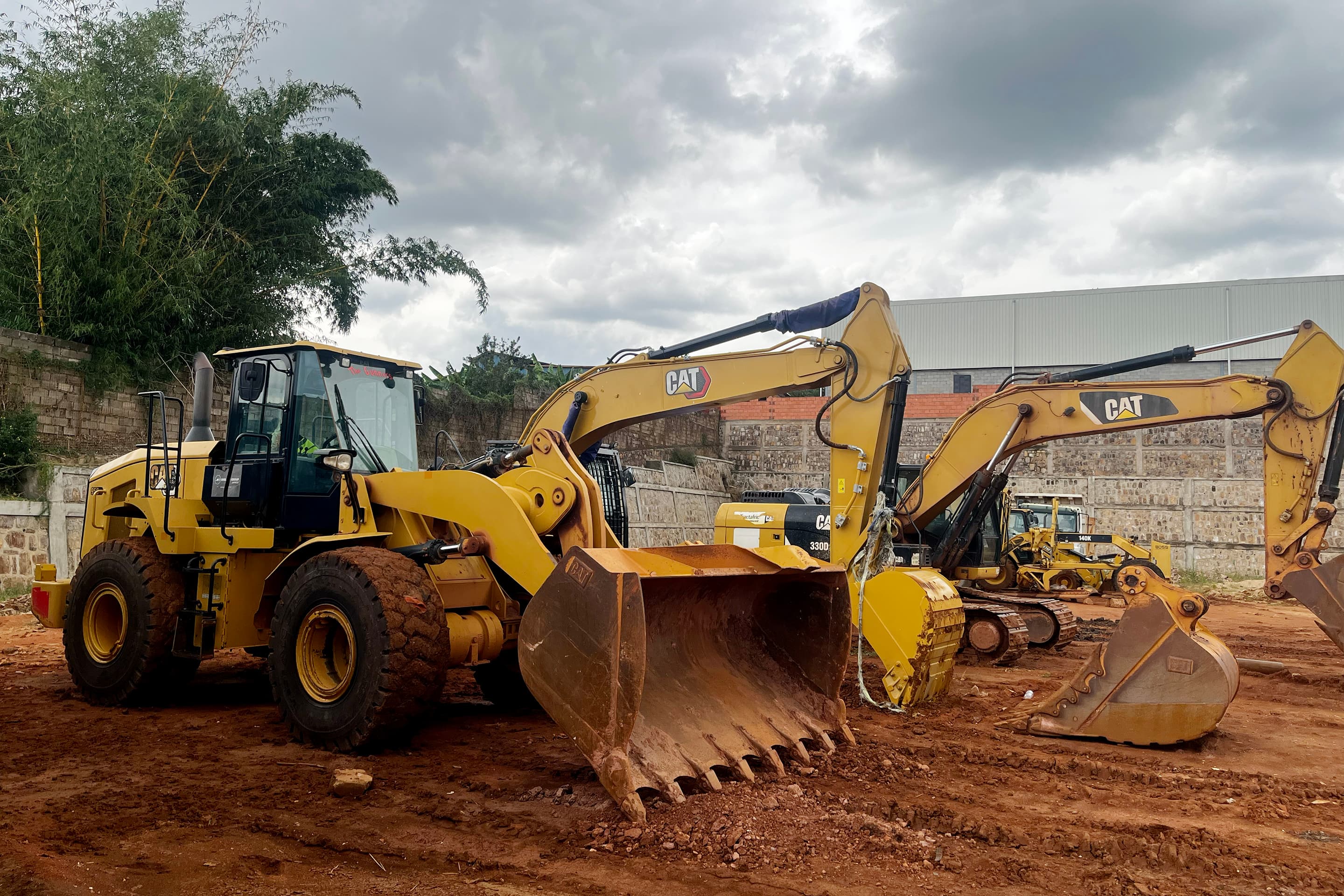 Wheel loader and dump truck working together on a site
