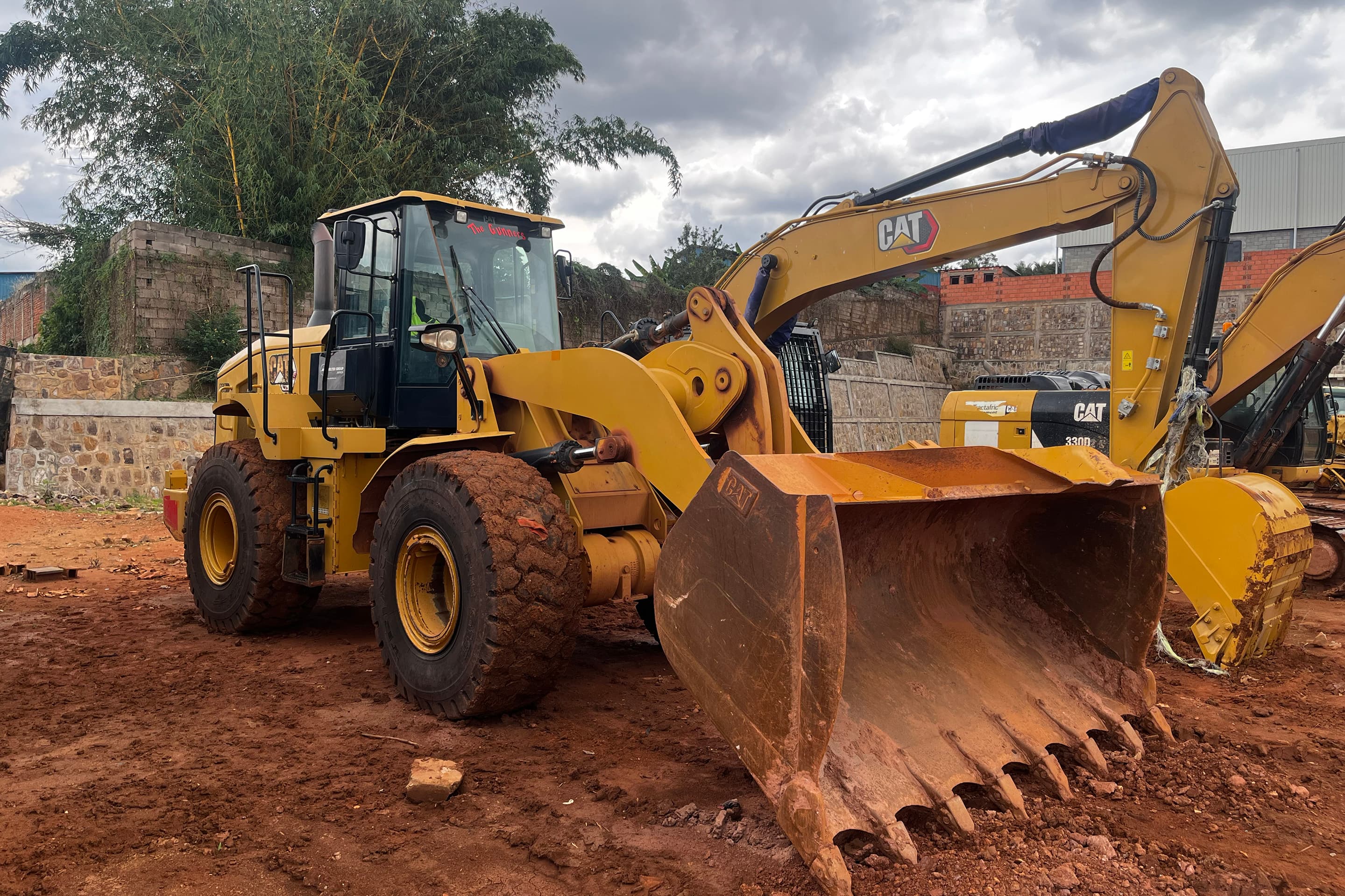 KAYOS wheel loader with raised bucket on a Rwandan site
